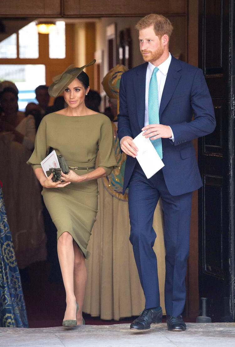 Меган Маркл и принц Гарри на крещении принца Луи Кембриджского в Сент-Джеймсском дворце 9 июля 2018 года в Лондоне, Англия