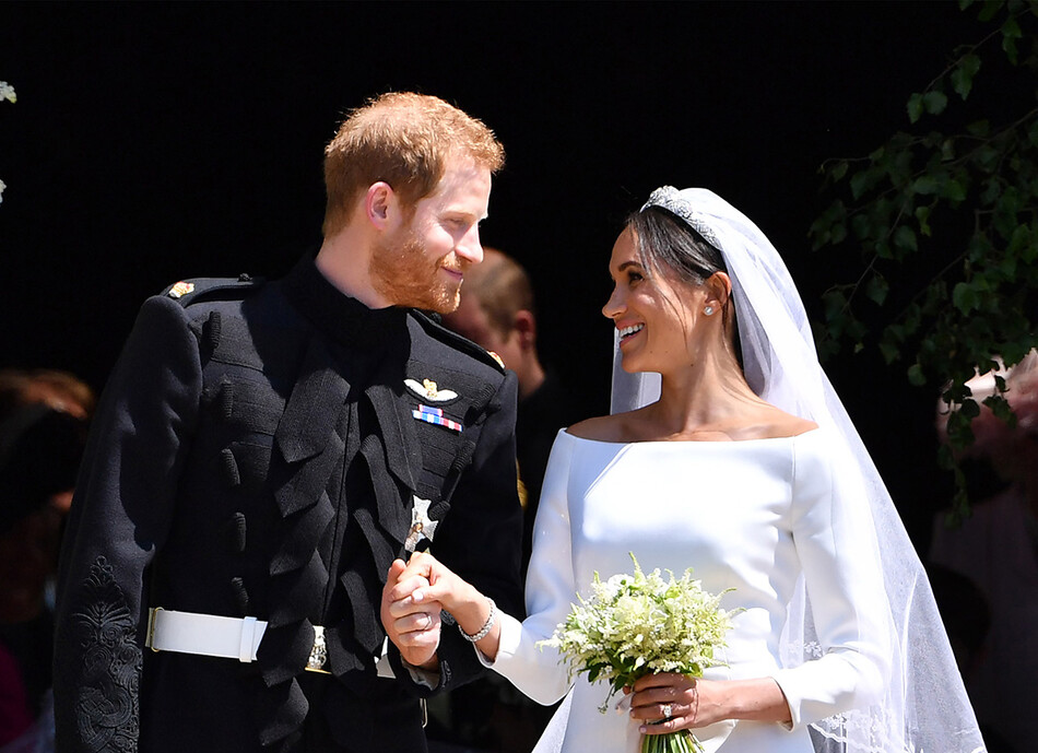 Герцоги Сассекские, принц Гарри и Меган Маркл во время их свадьбы 19 мая 2018 года. 