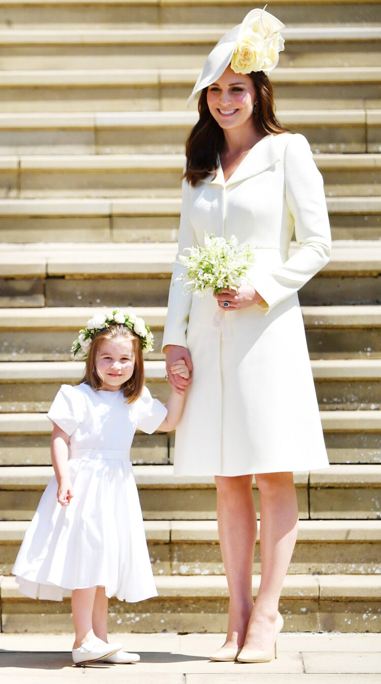 Принцесса Шарлотта и Кейт Миддлтон во время свадьбы принца Гарри и Меган Маркл в 2018 году