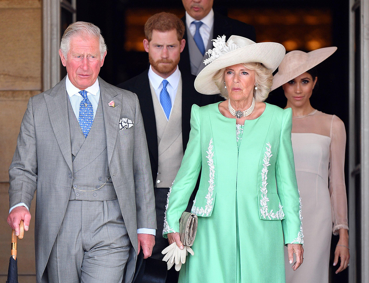 Принц Чарльз, Камилла Паркр-Боулз, принц Гарри и Меган Маркл во время парада по случаю дня рождения королевы Trooping The Color, 8 июня 2019 года в Лондоне, Англия